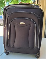 Olympia carry on suitcase.  With handle and