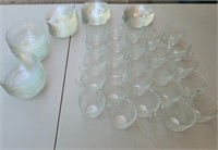 Glass bowls (11), cups (26) and saucers (27)