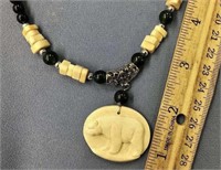 18" jade and ivory necklace with an ivory bear pen