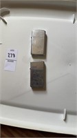 Two silver zippo lighters