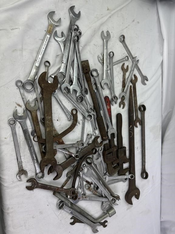 Assortment of wrenches and pipe wrenches