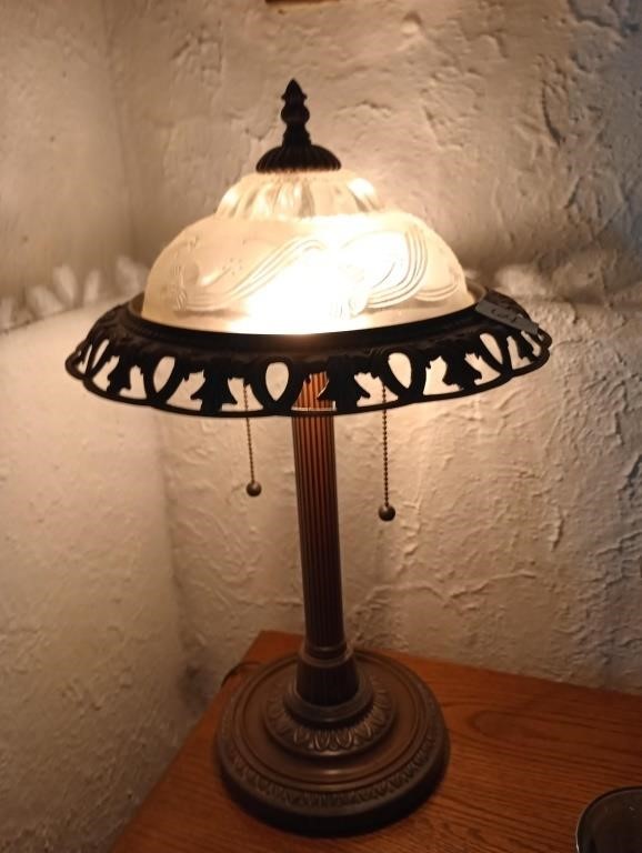 Amazing lamp with a tin and glass shade