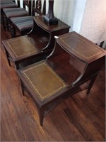 Pair of side tables with leather tops and