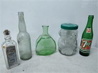lot of glass bottles and jars