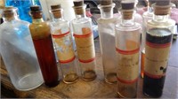 9-Petro sample bottles in wooden box
