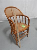 Antique caned barrel chair