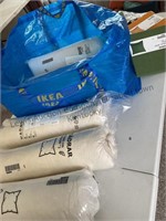 IKEA lot includes new pillows vacuum packed sizes