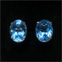 14K Yellow gold oval cut blue topaz stud earrings