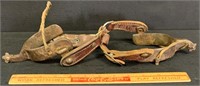 PAIR OF METAL SPURS WITH LEATHER STRAPS