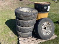 SET OF 4 235/75R15 TIRES ON RIMS;