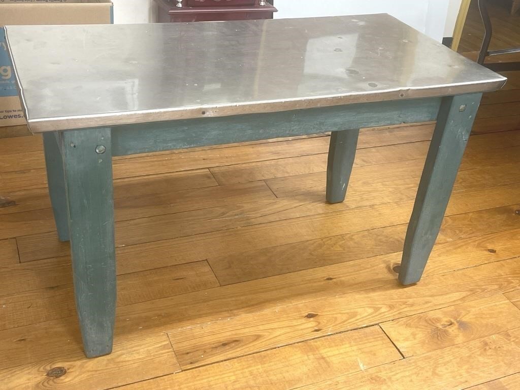 Very Solid Wooden Table With Stainless Steel Top.