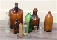 BOX OF BROWN, GREEN, & CLEAR BOTTLES
