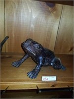 Small metal frog figurine