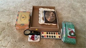 Cigar box, paint, gift wrap, tape measure,