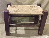 Wood and rattan footstool measures 17 x 12 x 11