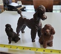 Three chocolate poodles, Red Mill and resin