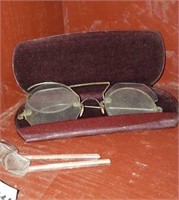 Antique eyeglasses and 2 glass salt spoons