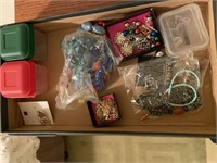 Box with necklaces, earrings, little storage tubs