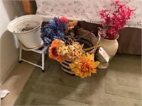 Wicker basket with flower decorations, vase,
