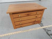 Small four drawer storage chest; approx. 19 1/2"