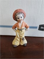 Porcelain farmer figure