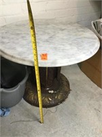 Brass table with marble top.  Very heavy