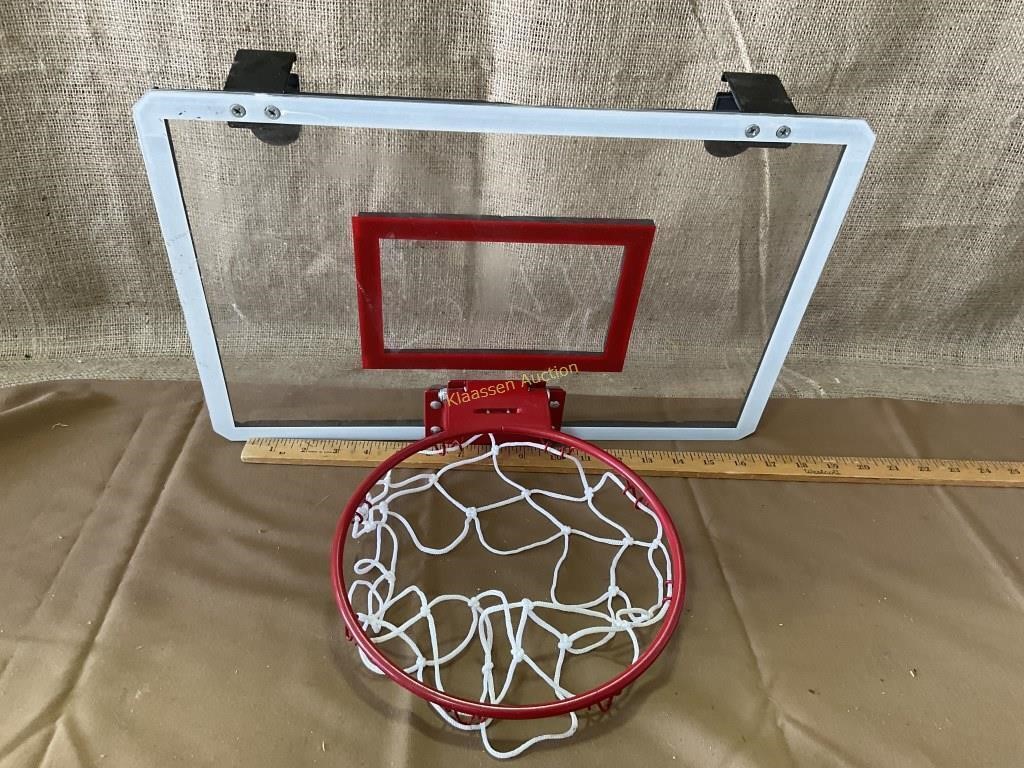 Basketball hoop mounts over a door