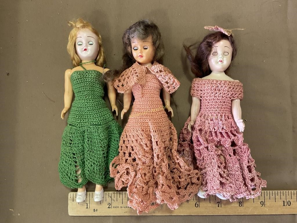 Vintage blinking eye dolls in crocheted dresses