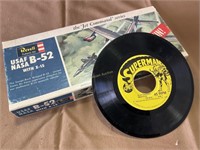 Superman story record and B-52 bomber model plane