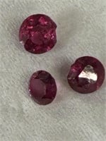 Trio of round cut rubies