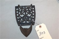 Antique cast iron holder