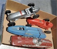 Box of four toy cars