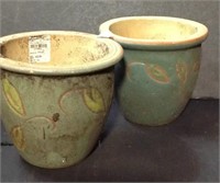 Two cool toned pottery planters