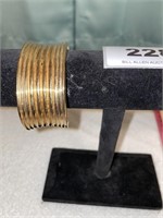 gold colored bracelet