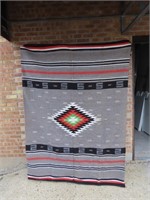 Nice woven blanket. 59"by 79"