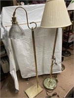 Two brass floor lamps