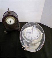 2 decorative clocks