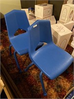 2 blue kids chairs