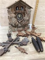 Cuckoo clock with 2 odd clock tops and pair of
