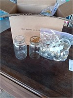 Box of canning jars with lids and more