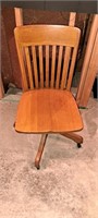 Wooden swivel rolling chair