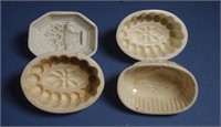 Four antique Spode jelly moulds