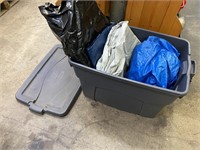 MANY TARPS IN TOTE W/ LID