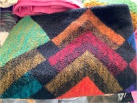 large black  and colors fleece throw