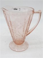 JEANNETTE GLASS FOOTED POINSETTIA PITCHER 8 IN TL