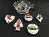 Red/green handle cookie cutters; glass juicer