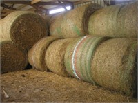 21 + or - ROUND BALES OF STRAW IN CALF BARN