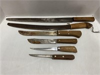 Lot of vintage wood handled knives and two corn