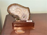 Two stone slices with stand