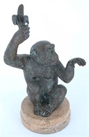 Bronze Chimpanzee Holding Banana Sculpture